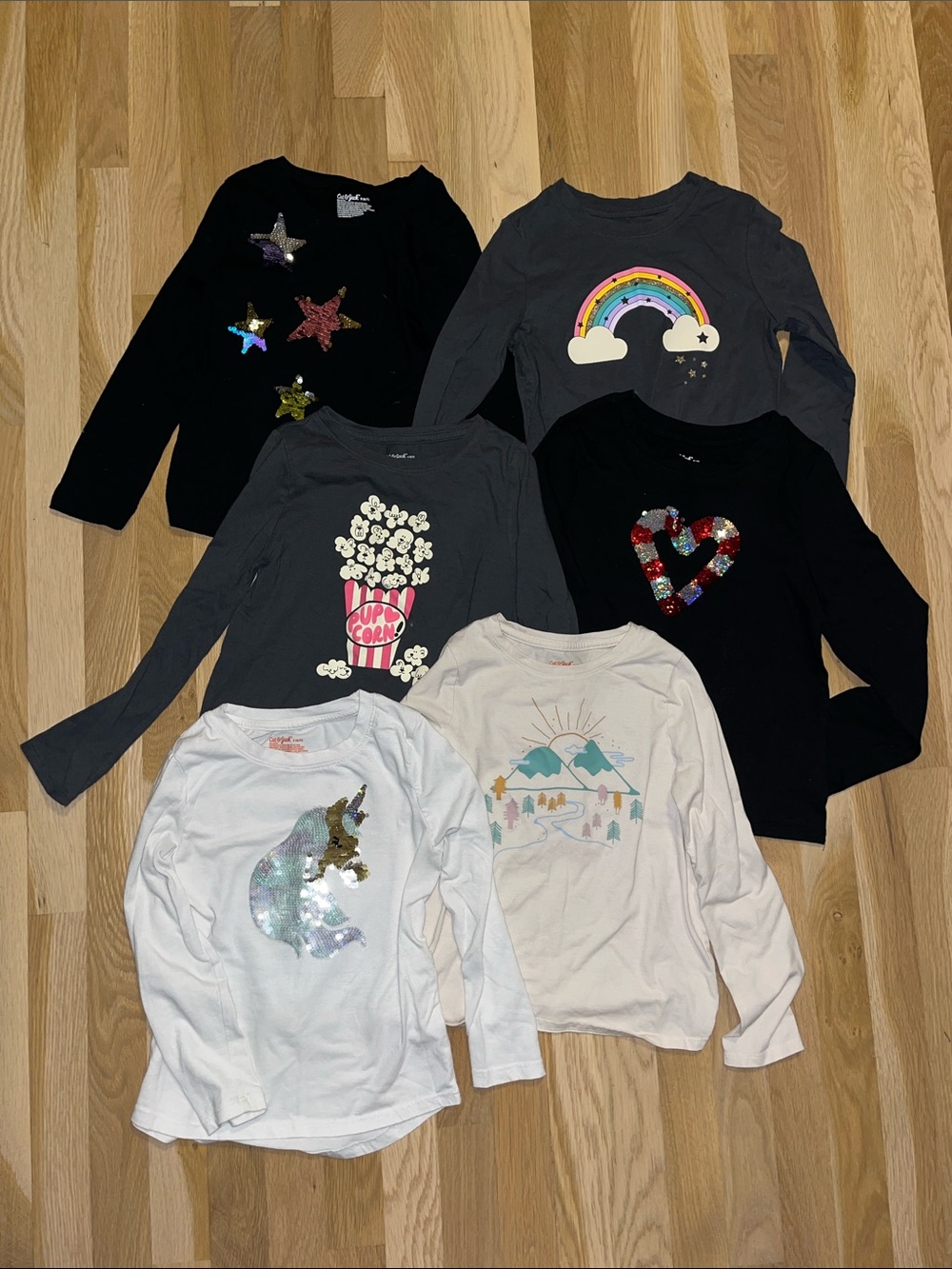 Bundle of six Cat & Jack long sleeve graphic tees size small (6/7)